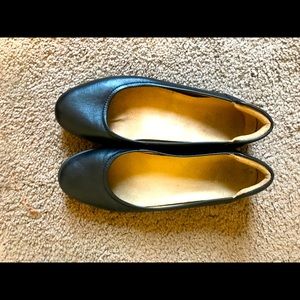 Black leather flats